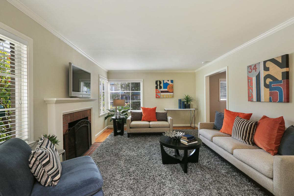 3 Victoria Road Burlingame, CA 94010 - Photo 6 of 31 a living room with furniture fireplace and a window