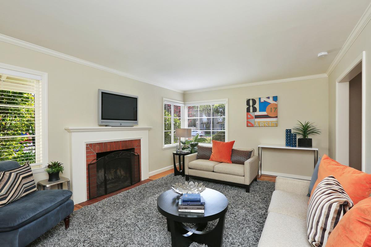 3 Victoria Road Burlingame, CA 94010 - Photo 7 of 31 a living room with furniture a rug and a fireplace