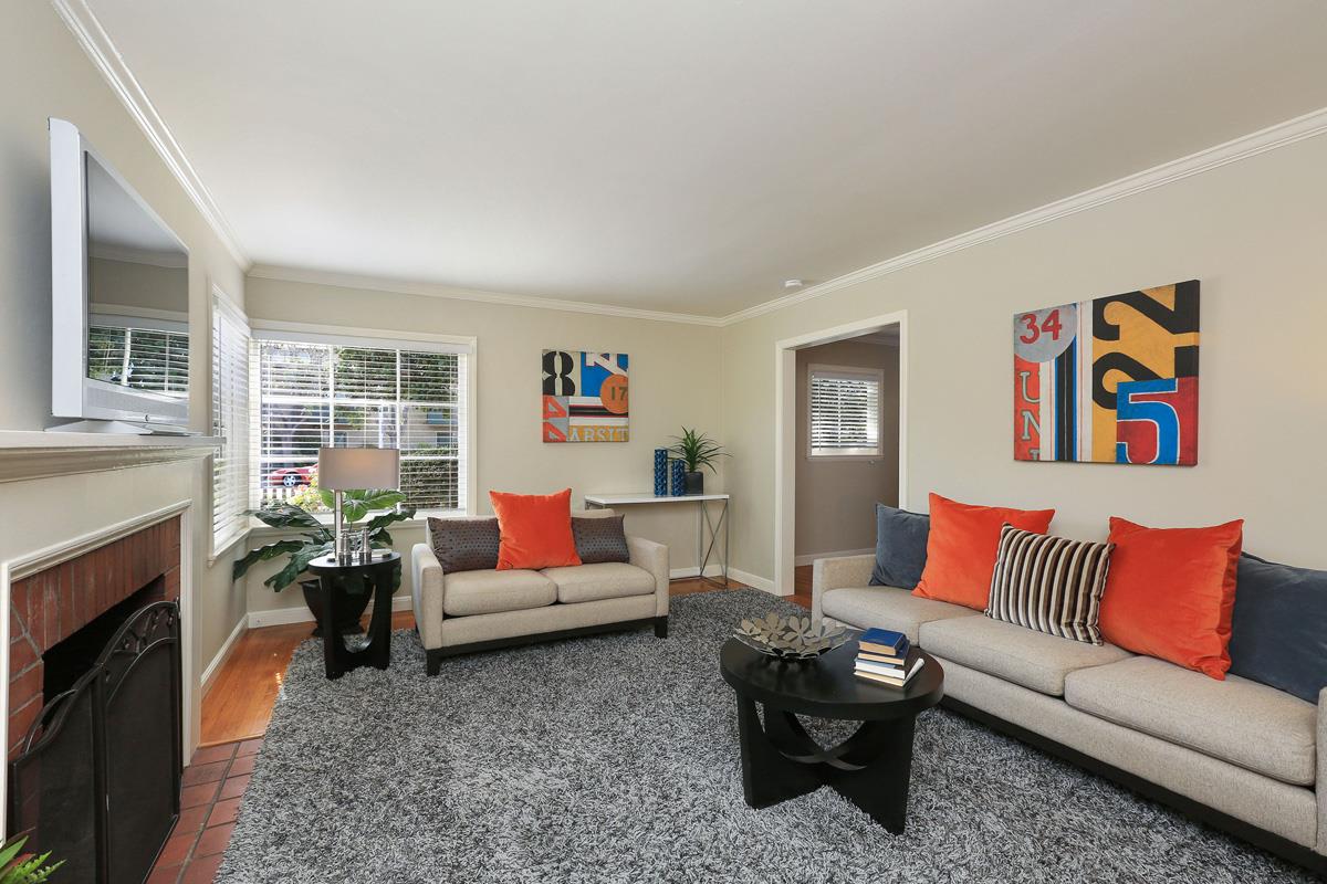 3 Victoria Road Burlingame, CA 94010 - Photo 8 of 31 a living room with furniture and a fireplace