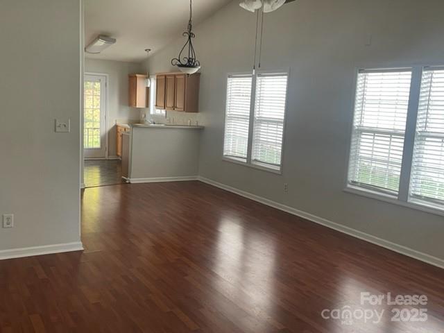 2012 Kansas City Drive Monroe, NC 28110 - Photo 4 of 14 an empty room with wooden floor and windows