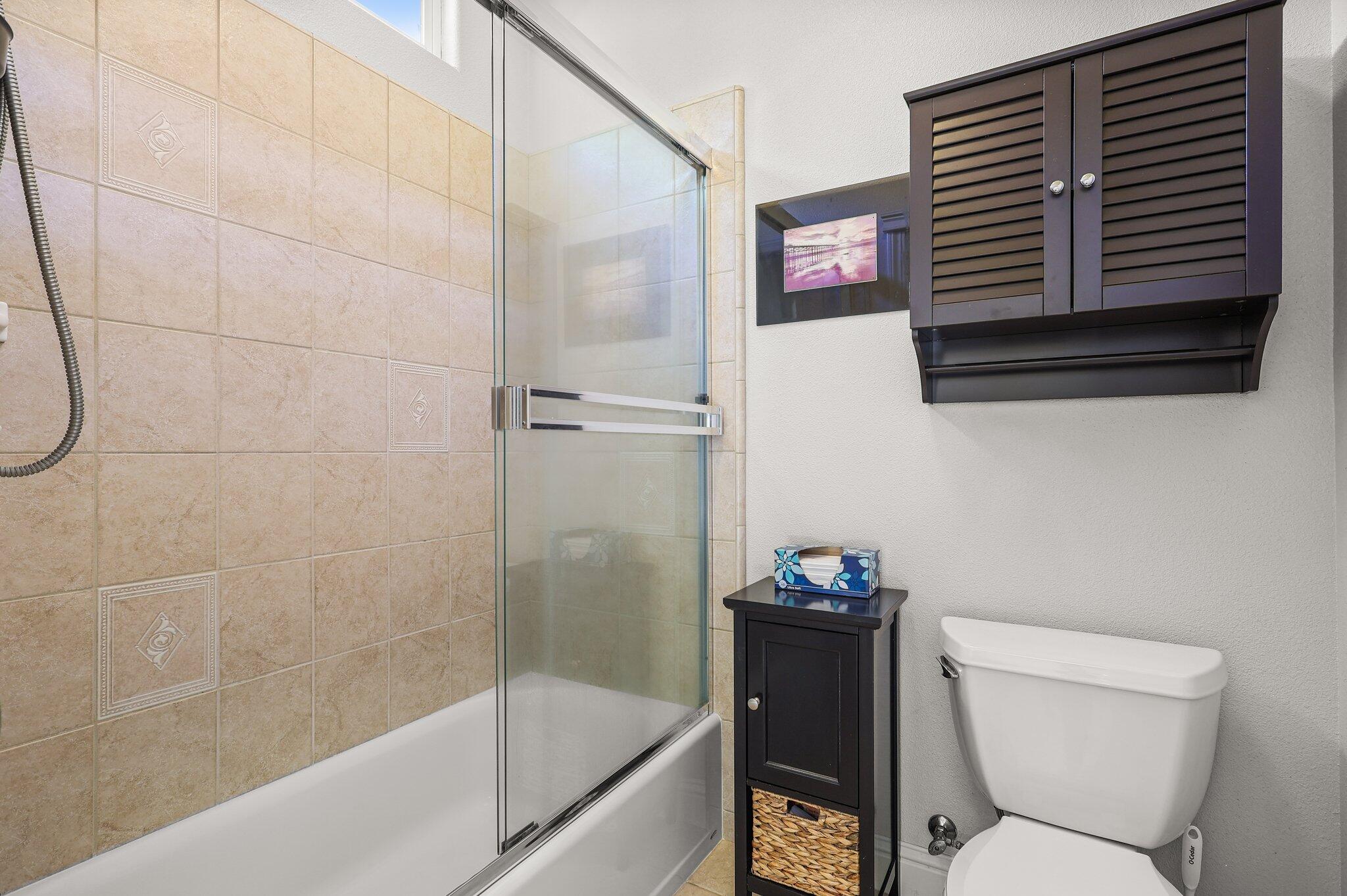 955 Leisha Lane Redding, CA 96001 - Photo 15 of 36 a bathroom with a toilet and a shower