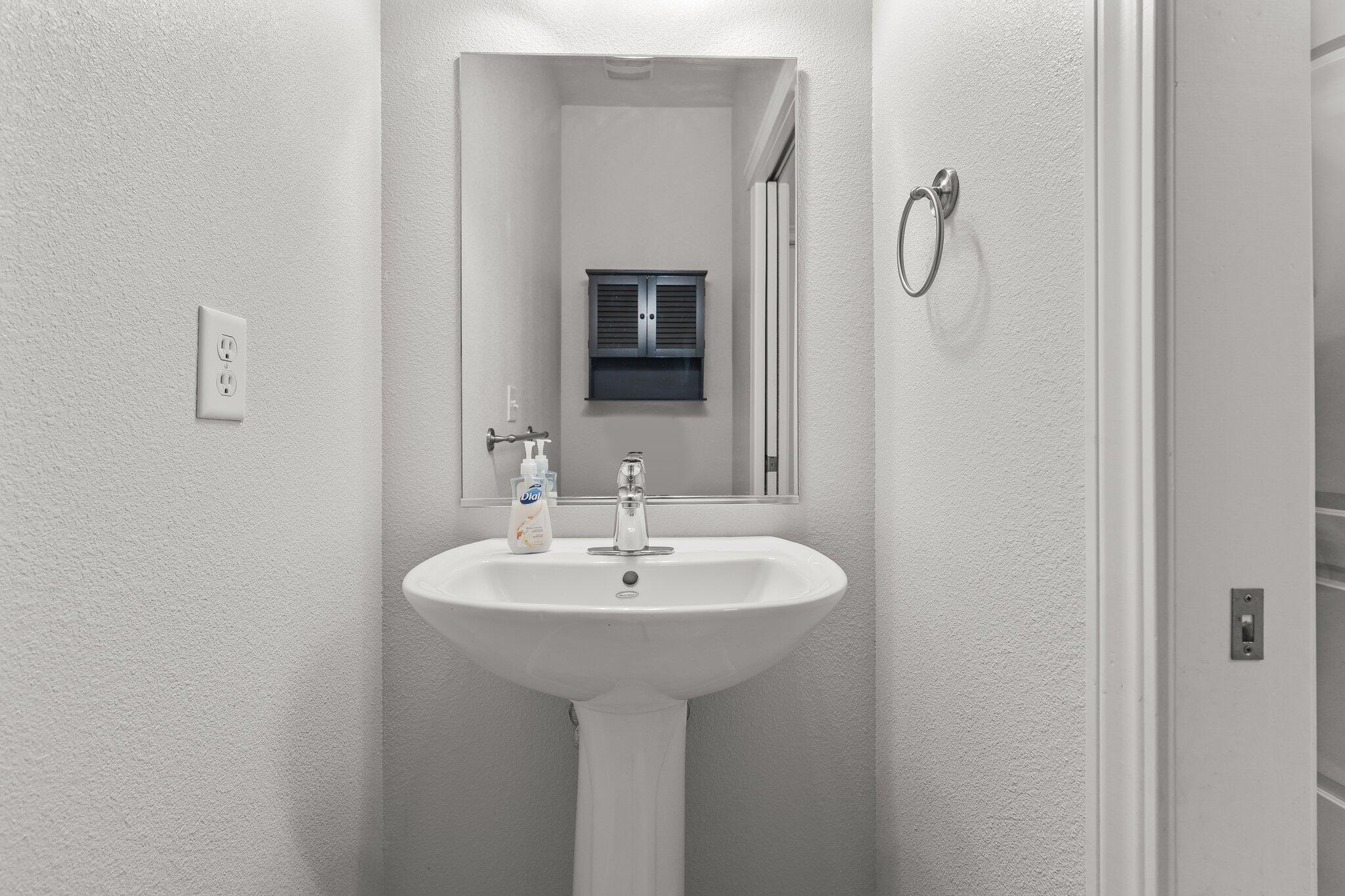 955 Leisha Lane Redding, CA 96001 - Photo 23 of 36 a bathroom with a sink and a mirror