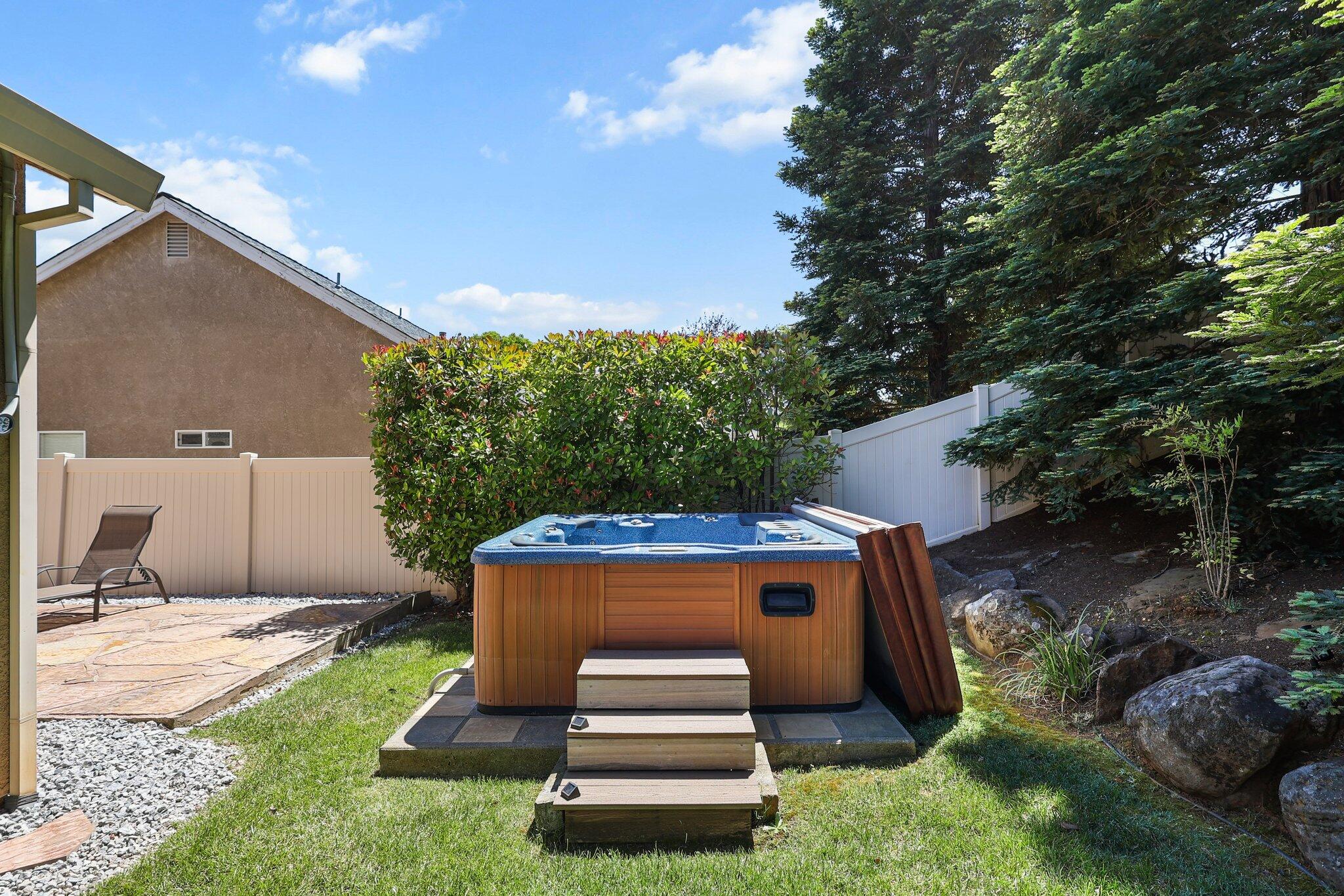 955 Leisha Lane Redding, CA 96001 - Photo 27 of 36 a front view of a house with a yard