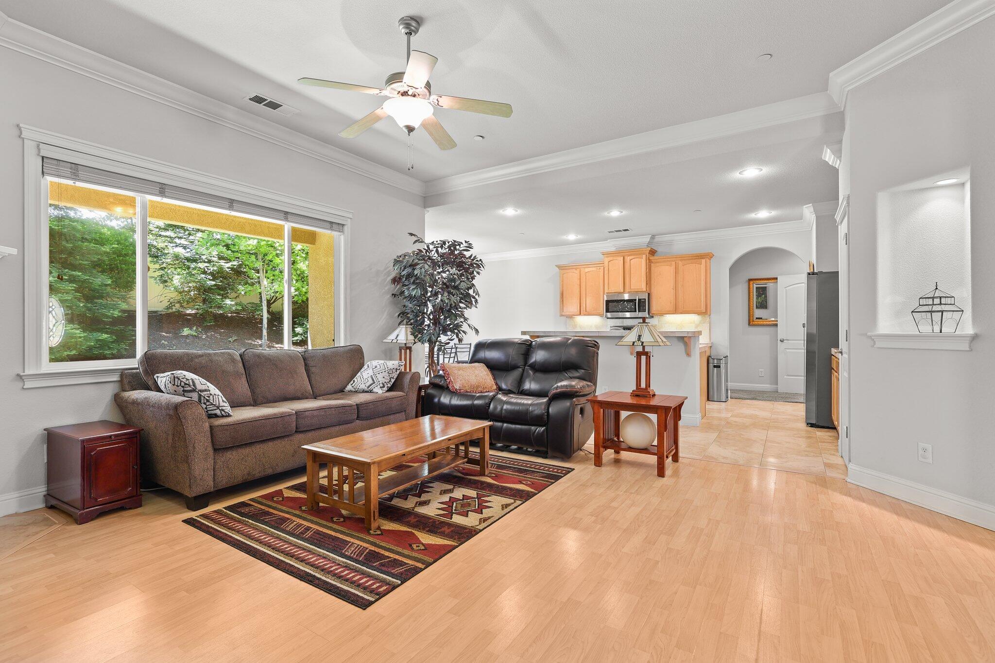 955 Leisha Lane Redding, CA 96001 - Photo 10 of 36 a living room with furniture and a large window