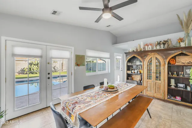 a living room with furniture and flat screen tv