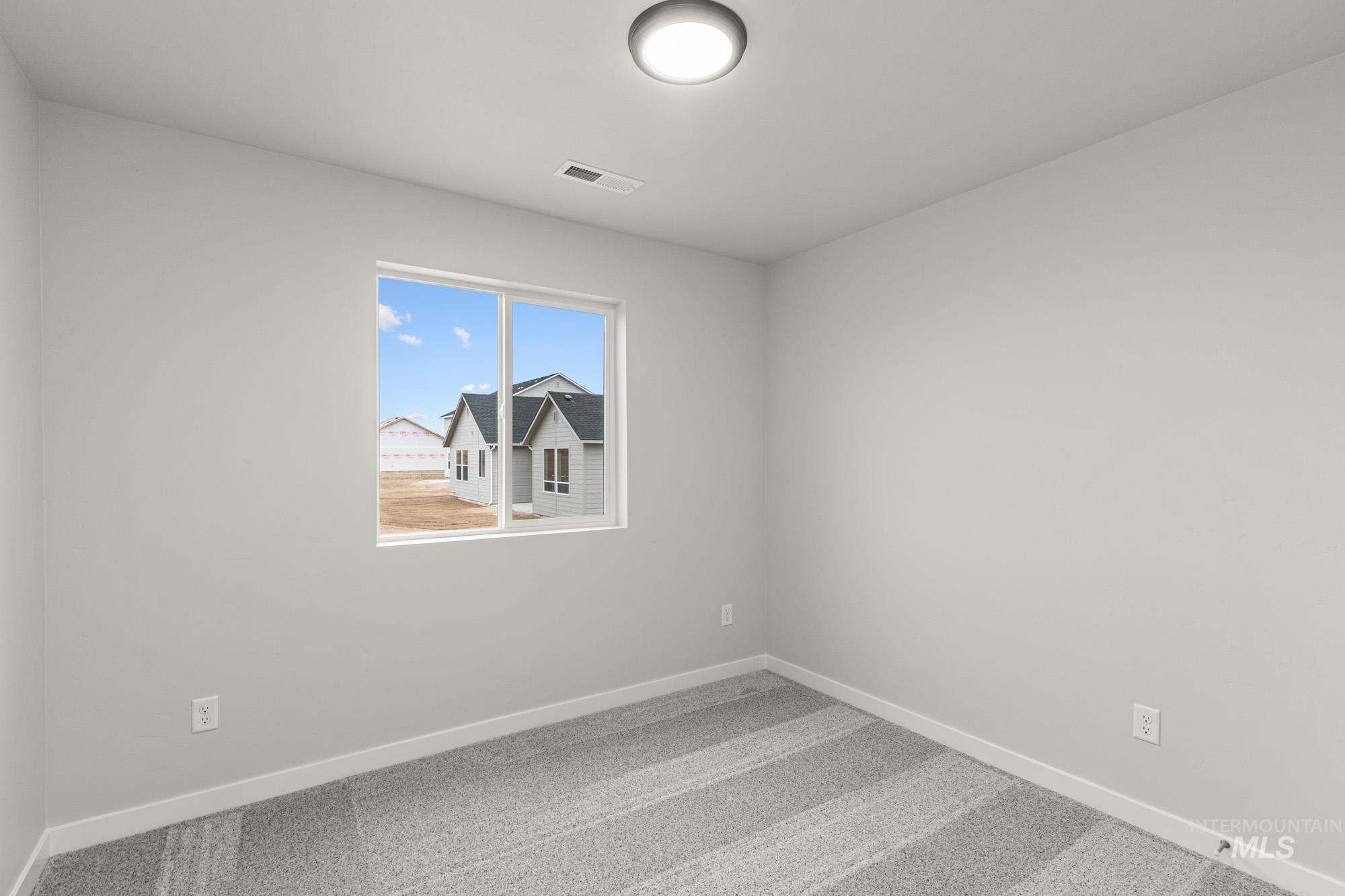 4287 South Red Sox Way Nampa, ID 83686 - Photo 9 of 22 Unfurnished room with carpet
