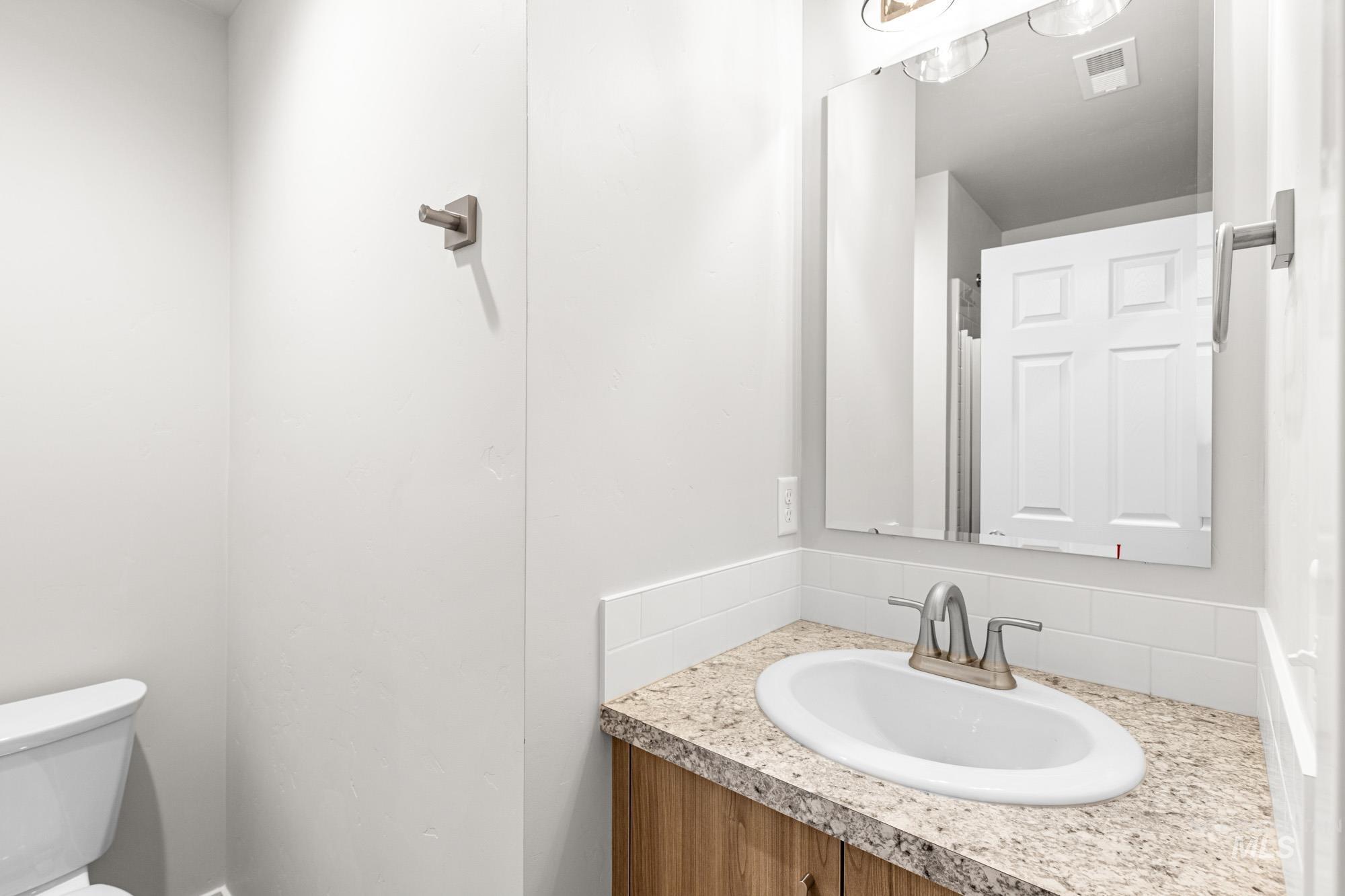 4287 South Red Sox Way Nampa, ID 83686 - Photo 10 of 22 Bathroom with vanity and toilet