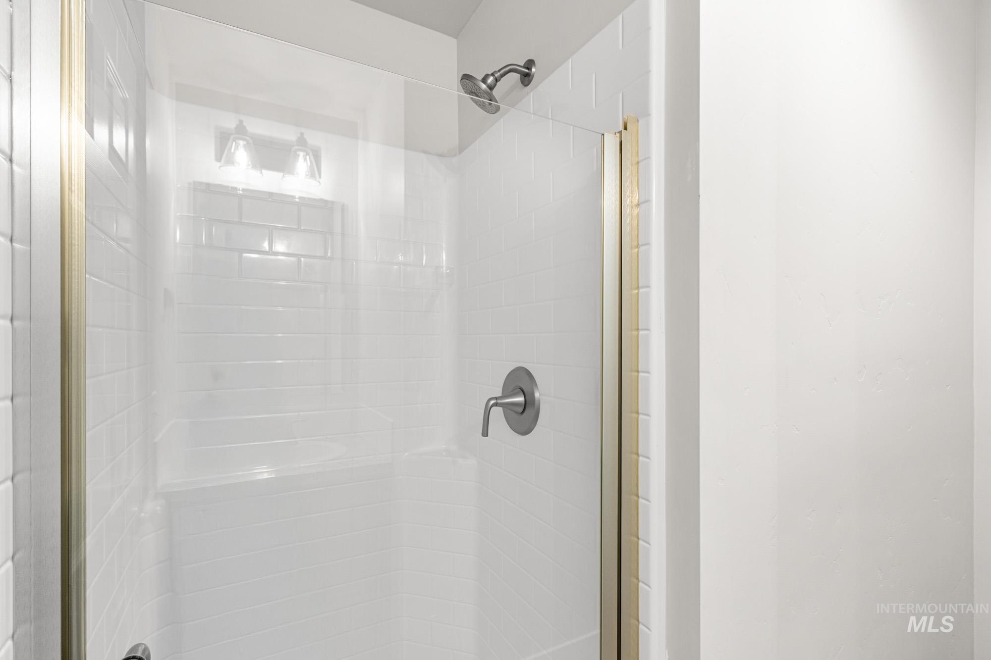 4287 South Red Sox Way Nampa, ID 83686 - Photo 11 of 22 Bathroom with a shower stall