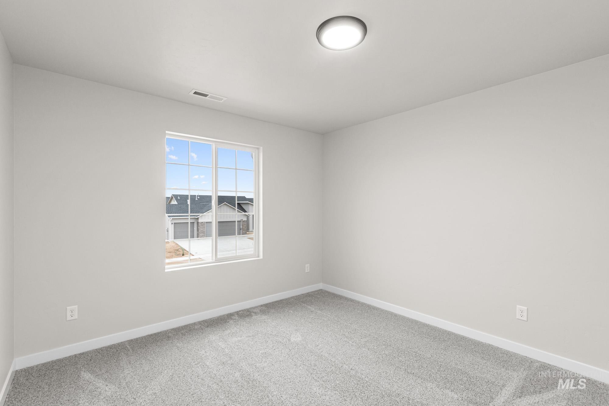4287 South Red Sox Way Nampa, ID 83686 - Photo 20 of 22 Carpeted empty room with baseboards