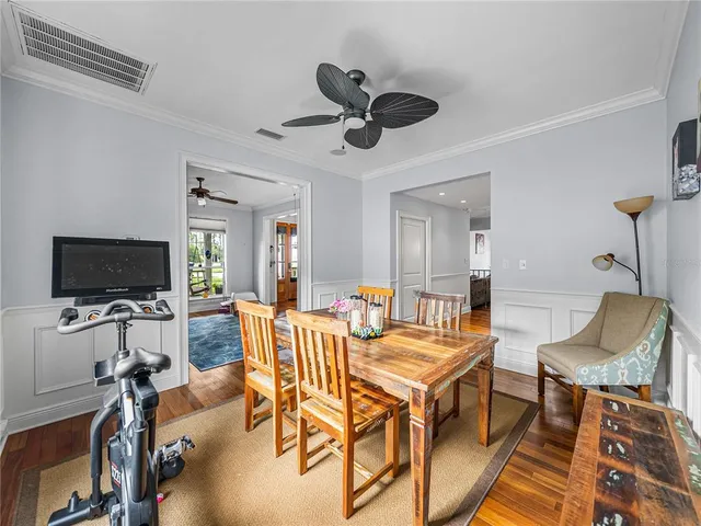 a view of a livingroom with furniture and a flat screen tv