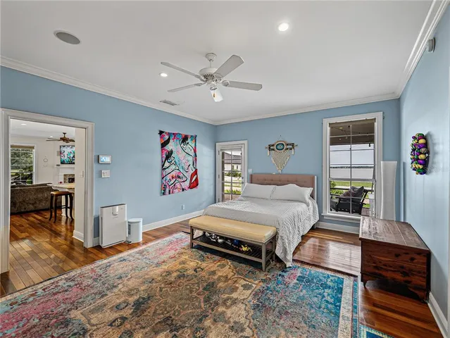 a bedroom with a bed and dresser