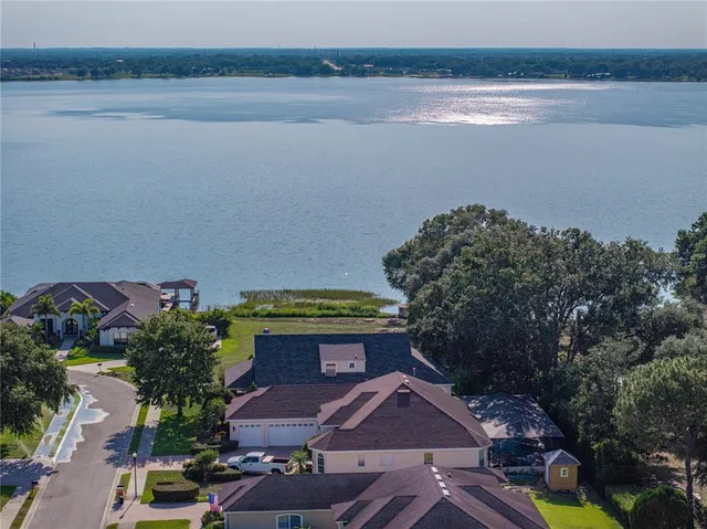 a front view of a house with lake view