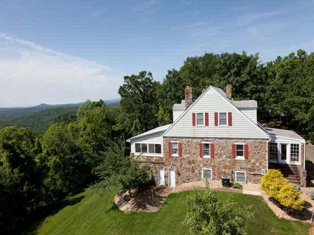 5614 Supinlick Ridge Road Mount Jackson, VA 22842 - Photo 1 of 39 a front view of a house with a yard