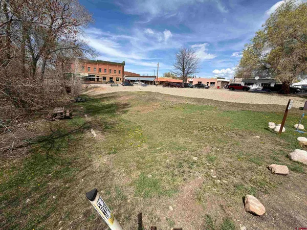 a view of a yard with an outdoor space