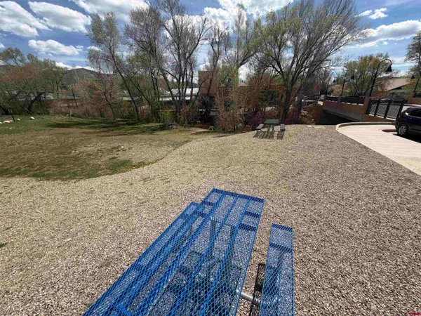 a view of a yard covered in snow