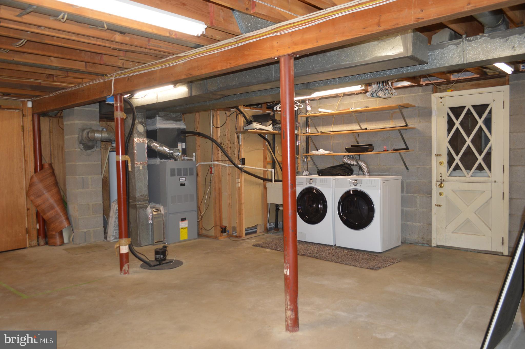 5931 Snowdens Run Road Sykesville, MD 21784 - Photo 30 of 31 Walk out basement with storage agea