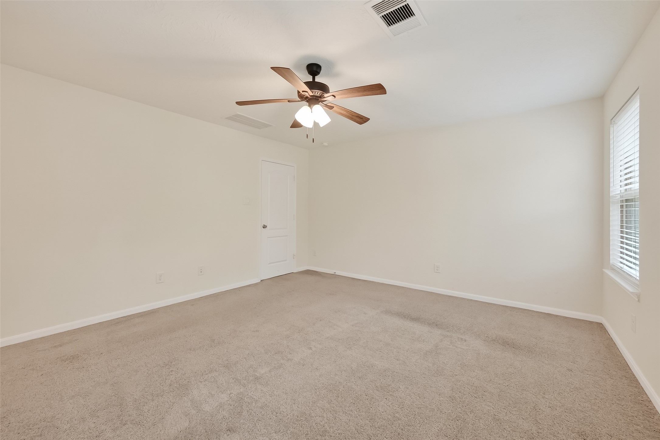 2107 Parnevik Place Conroe, TX 77304 - Photo 23 of 44 The Primary bedroom