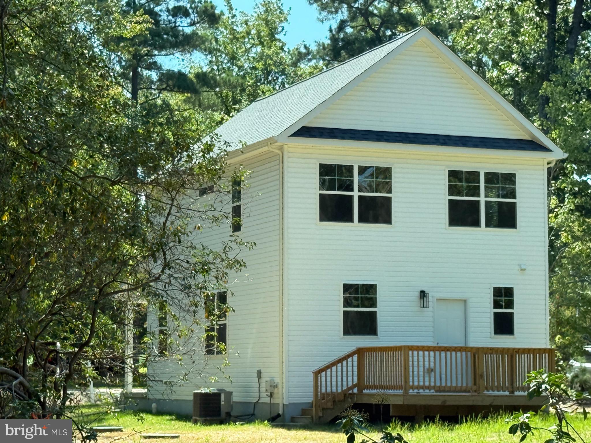 252 Lighthouse Lane Montross, VA 22520 - Photo 2 of 11 a aerial view of a house next to a yard