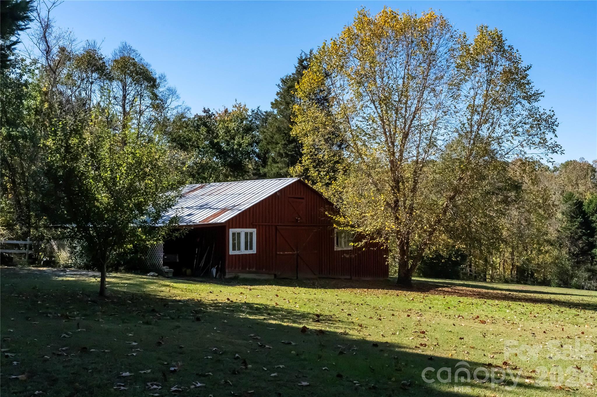 1264 Lilly Drive Clover, SC 29710 - Photo 22 of 37 a front view of a house with a yard and trees