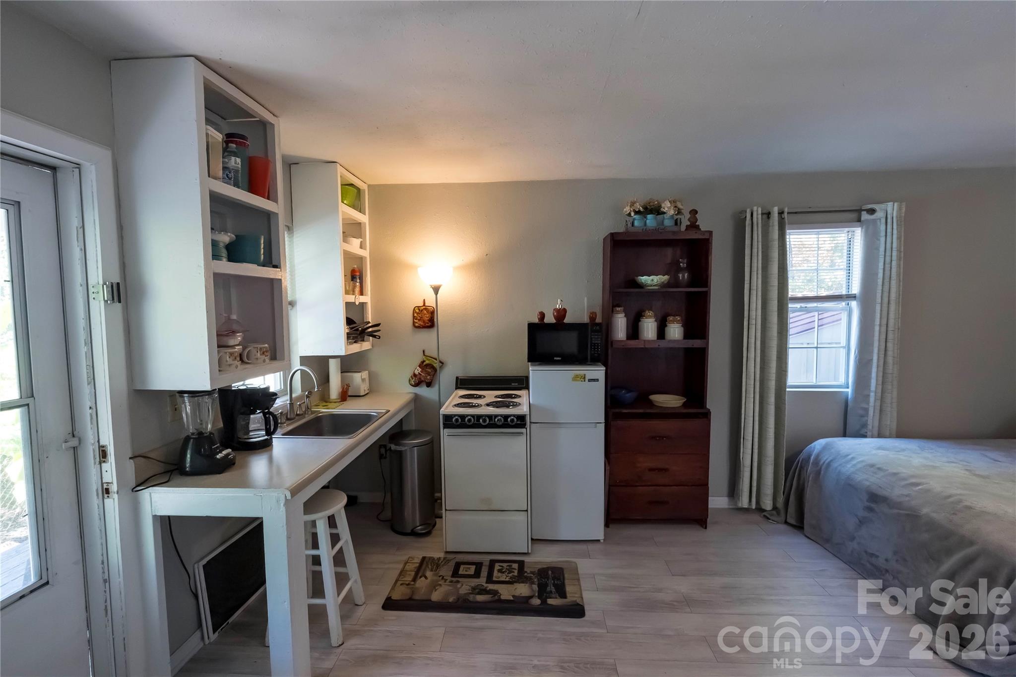 1264 Lilly Drive Clover, SC 29710 - Photo 28 of 37 a kitchen with a refrigerator and a stove