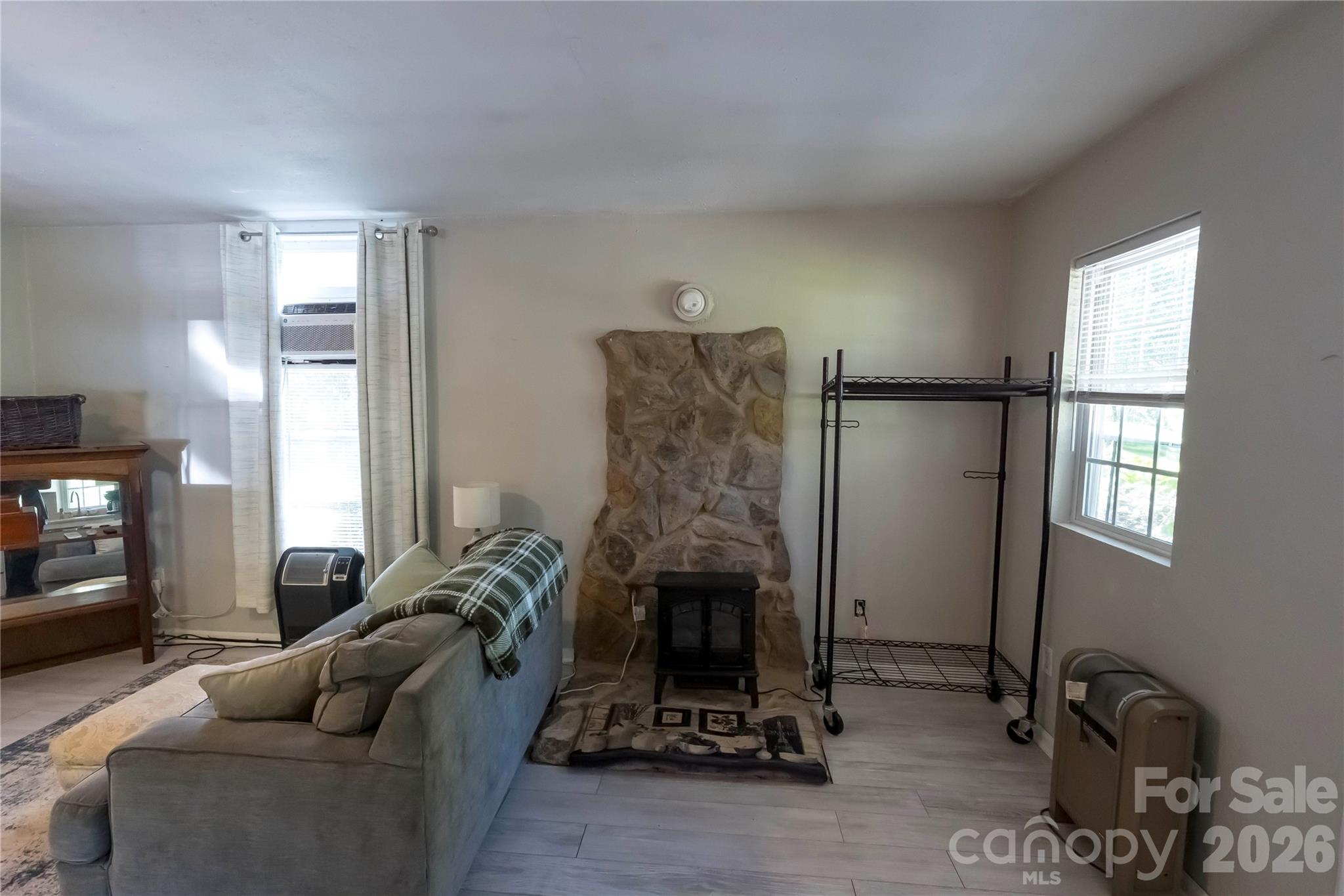 1264 Lilly Drive Clover, SC 29710 - Photo 33 of 37 a living room with furniture gym equipment and a fireplace