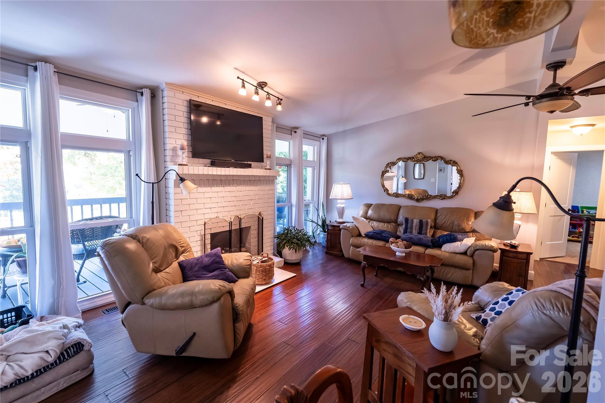 1264 Lilly Drive Clover, SC 29710 - Photo 7 of 37 a living room with furniture fireplace and a flat screen tv