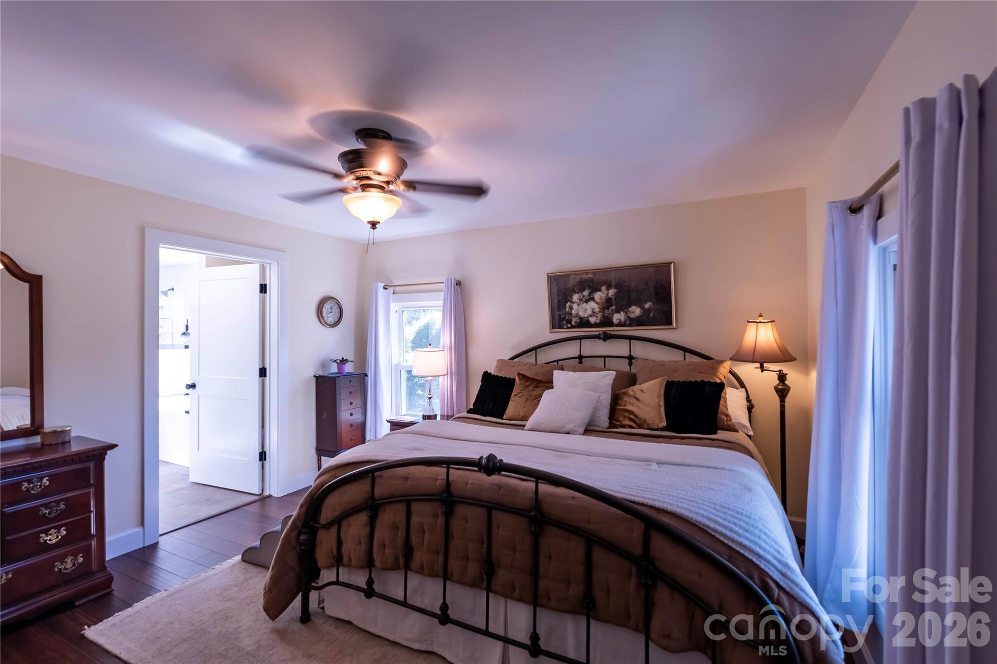 1264 Lilly Drive Clover, SC 29710 - Photo 10 of 37 a bedroom with a bed and a chandelier