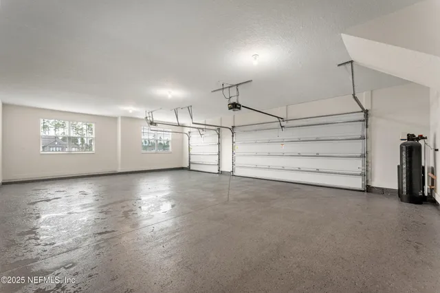 a view of a room with stairs and a window