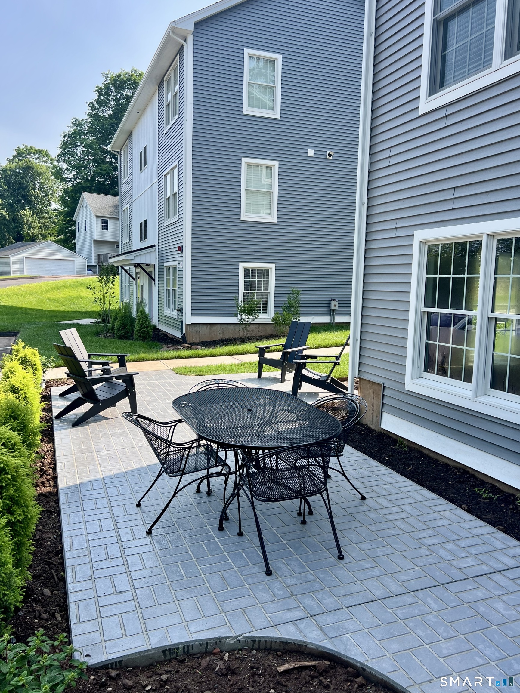 177 Butternut Street, Unit 3 Middletown, CT 06457 - Photo 19 of 23 a swimming pool with outdoor seating and yard