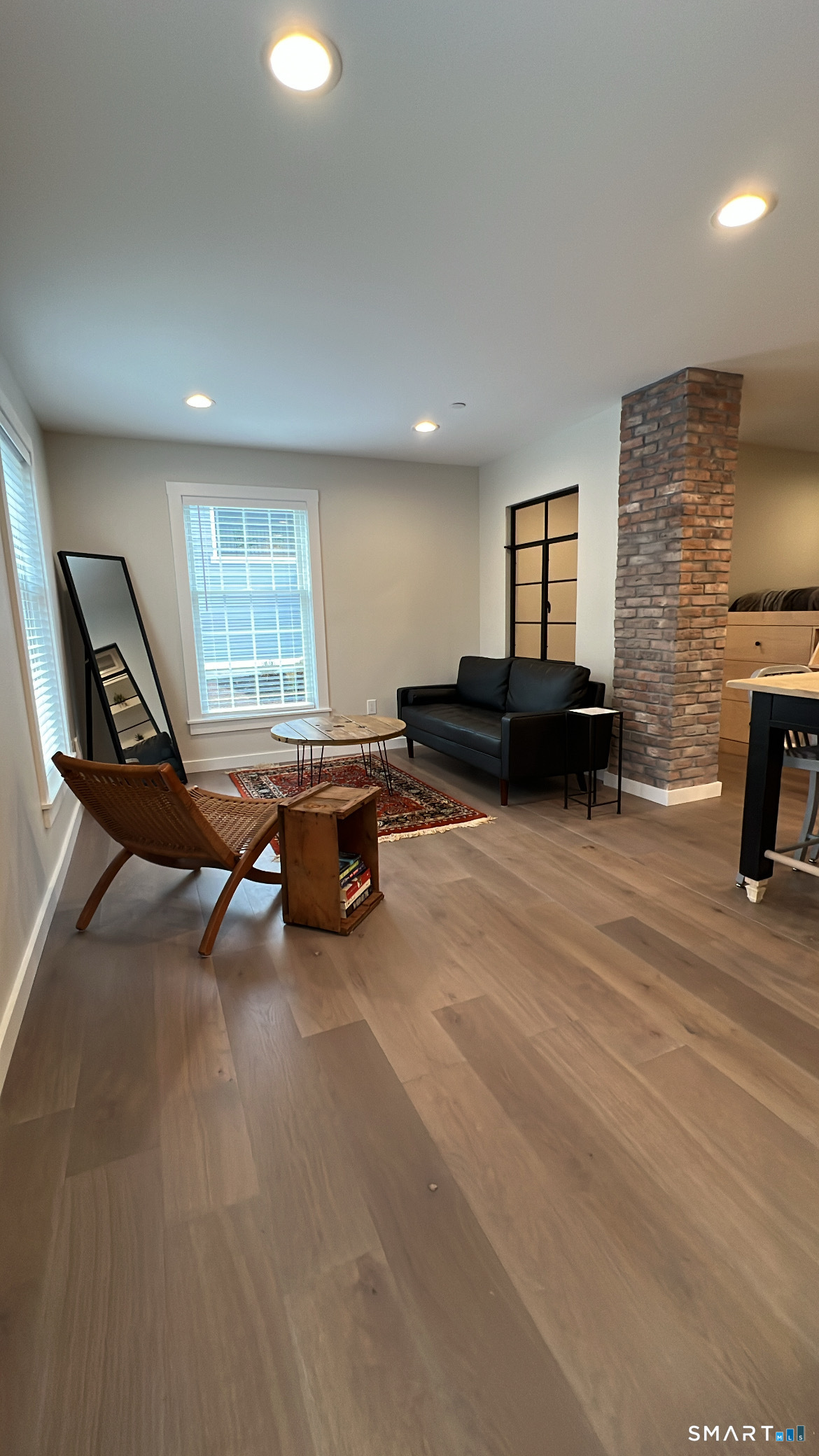 177 Butternut Street, Unit 3 Middletown, CT 06457 - Photo 9 of 23 a living room with furniture and a fireplace