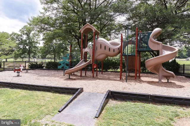 a view of a porch with furniture and a fire pit
