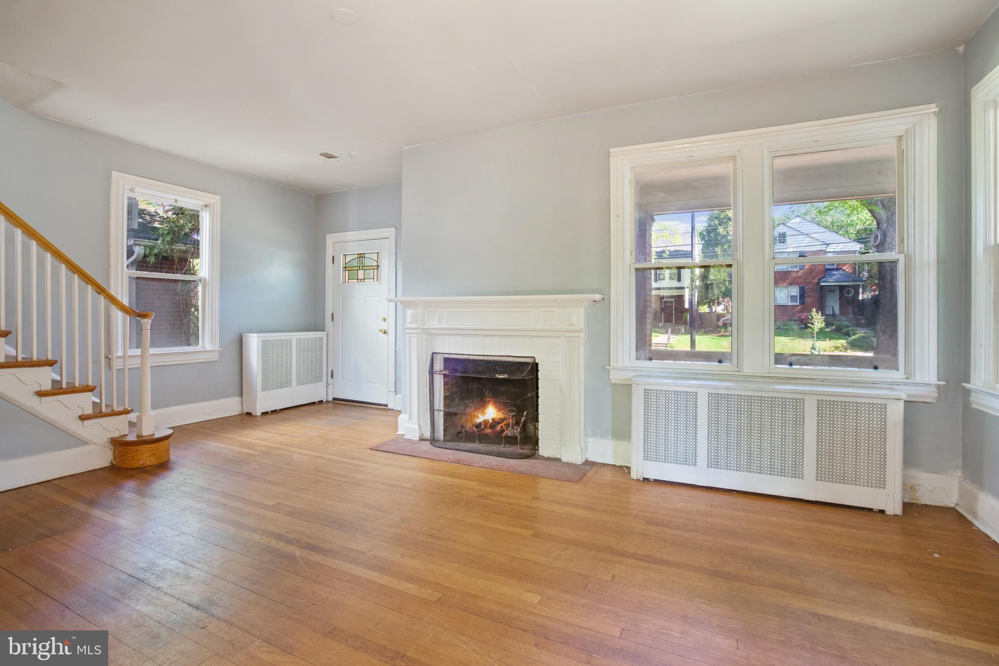 3202 Military Road Northwest Washington, DC 20015 - Photo 6 of 26 Living Room with wood burning fireplace