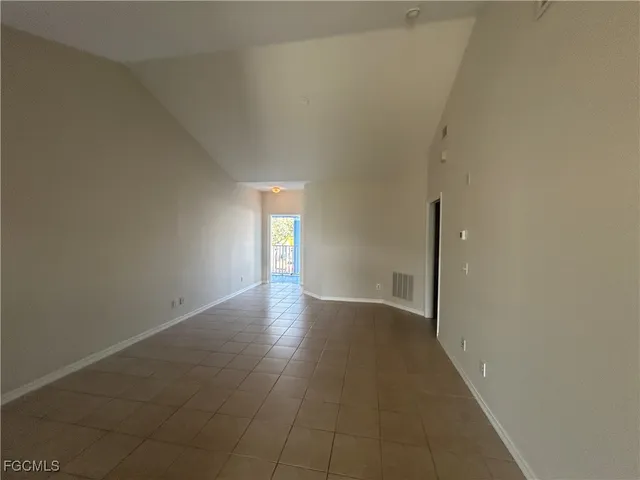 a view of an empty room and window