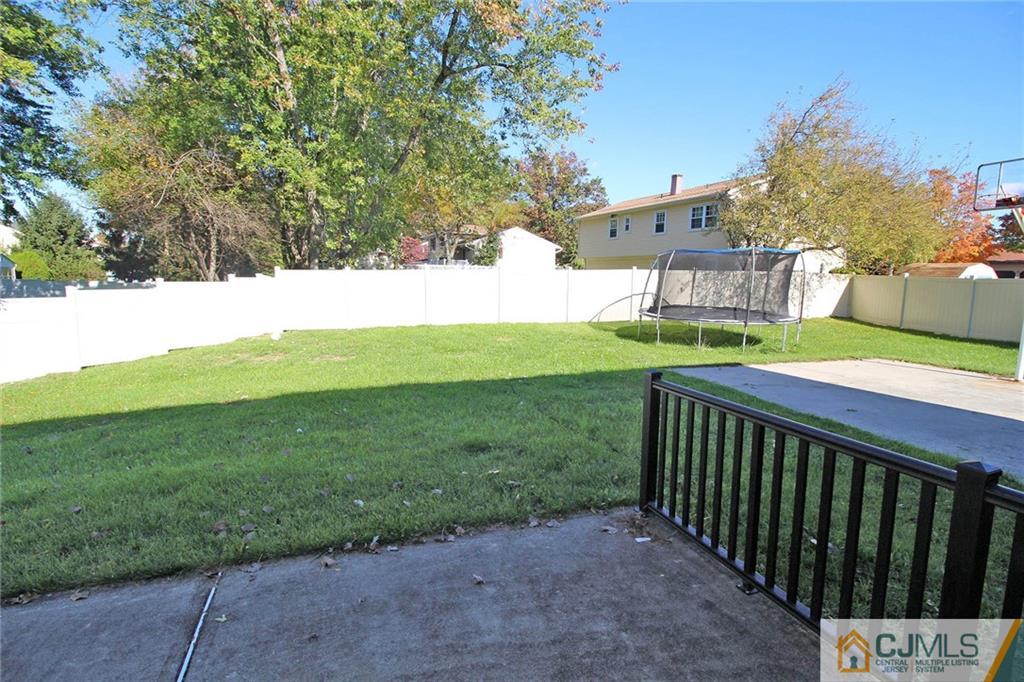 102 Running Brook Road Ewing, NJ 08638 - Photo 22 of 24 a view of a backyard with a garden