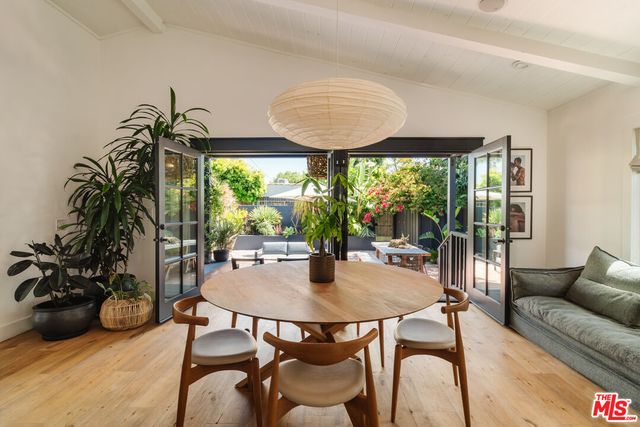 a outdoor space with lots of potted plants