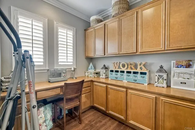 a view of a backyard with plants and lake view
