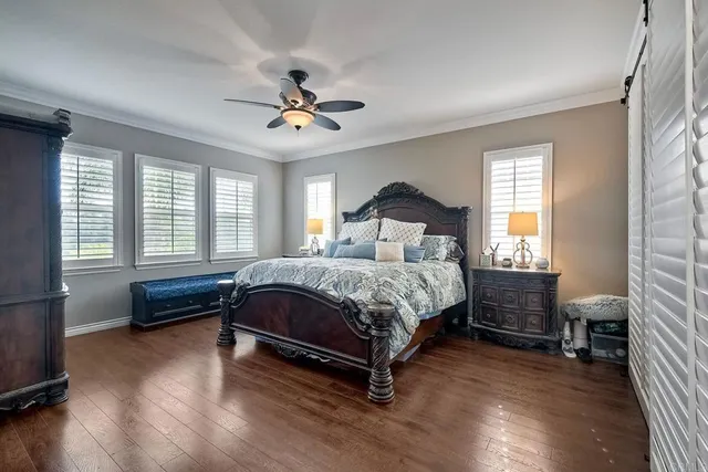 a view of a backyard with swimming pool