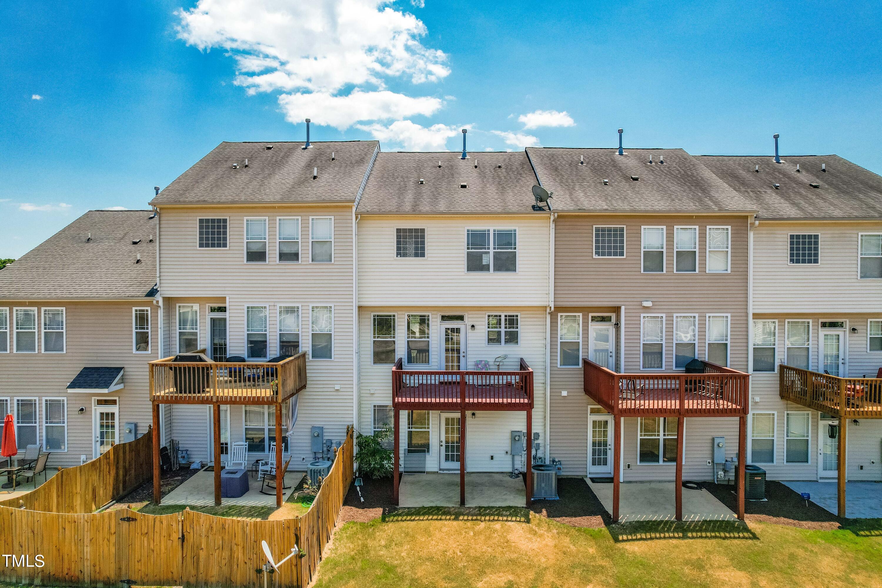 4419 Iyar Way Wake Forest, NC 27587 - Photo 26 of 26 a view of a building with a swimming pool
