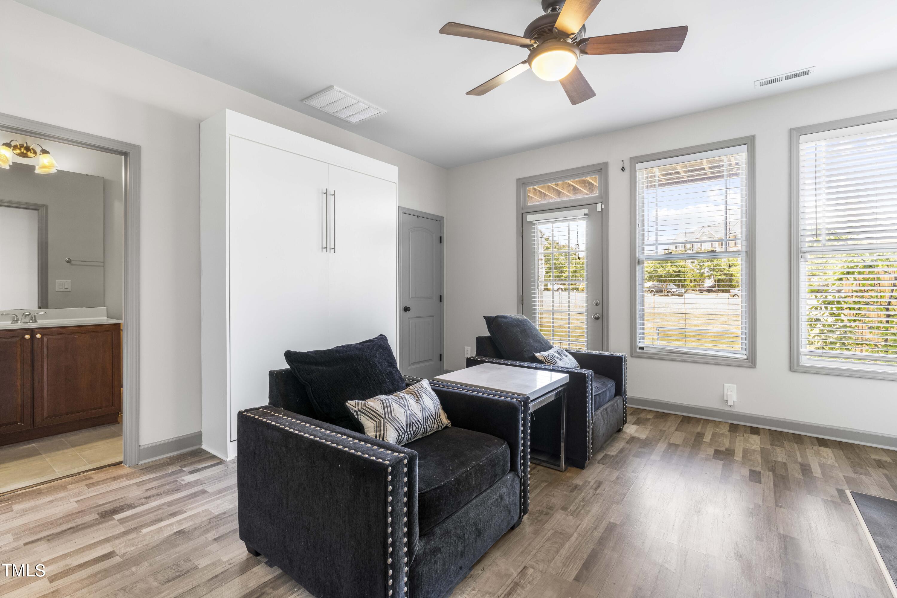 4419 Iyar Way Wake Forest, NC 27587 - Photo 4 of 26 a living room with furniture and a window