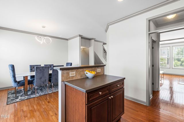 a view of kitchen island with wooden floor