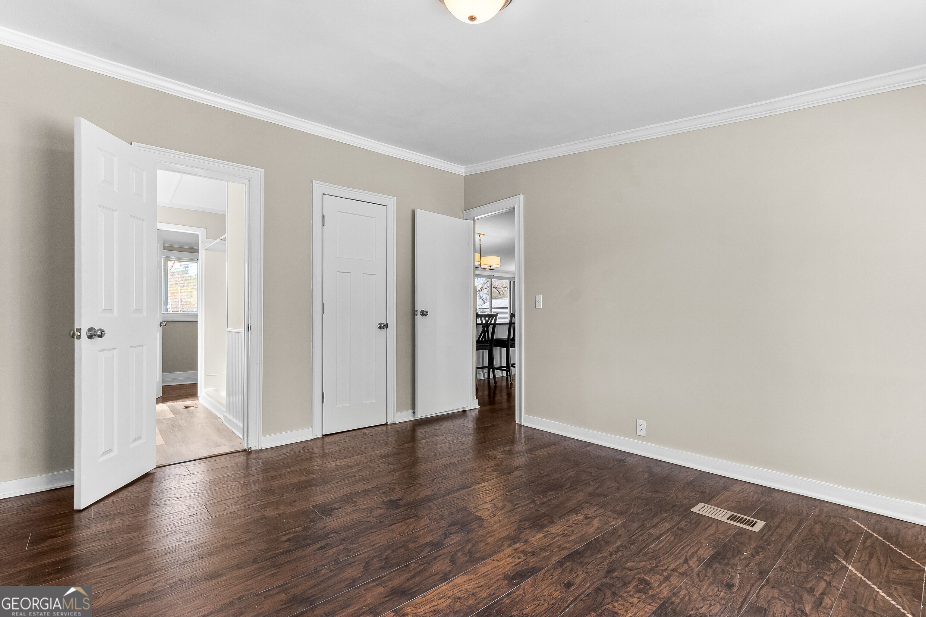 129 Walnut Street Bonaire, GA 31005 - Photo 18 of 31 a view of an empty room with wooden floor