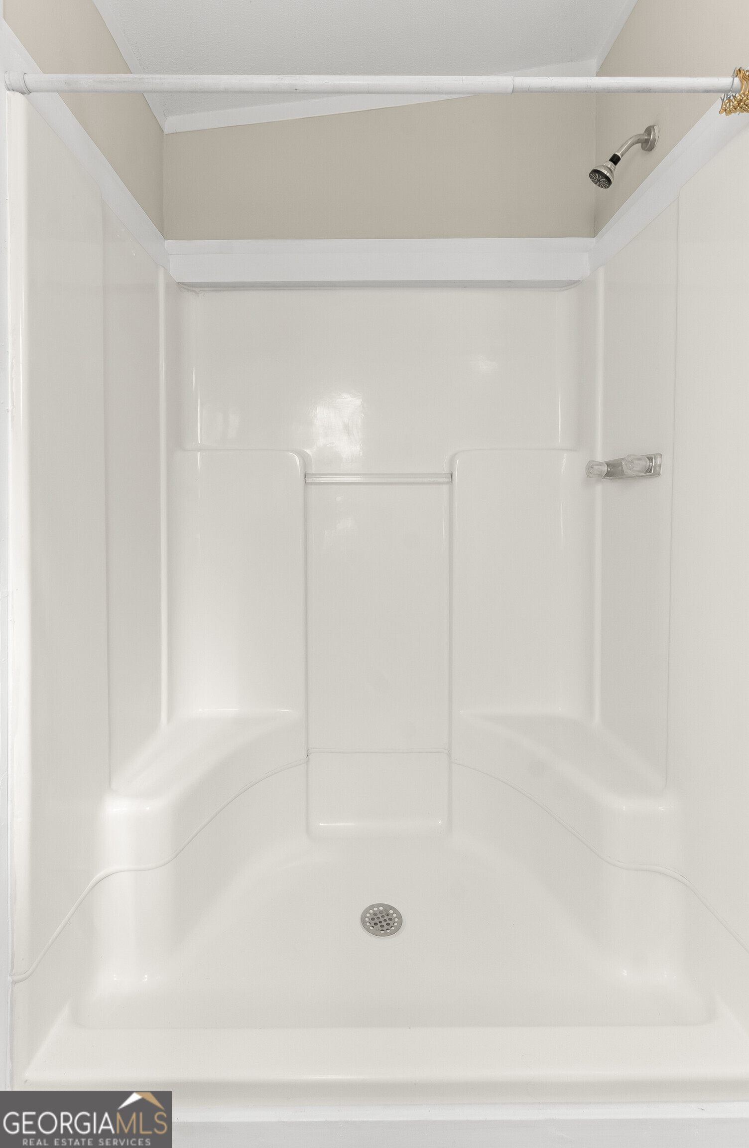 129 Walnut Street Bonaire, GA 31005 - Photo 20 of 31 a bathroom with a shower and a bath tub