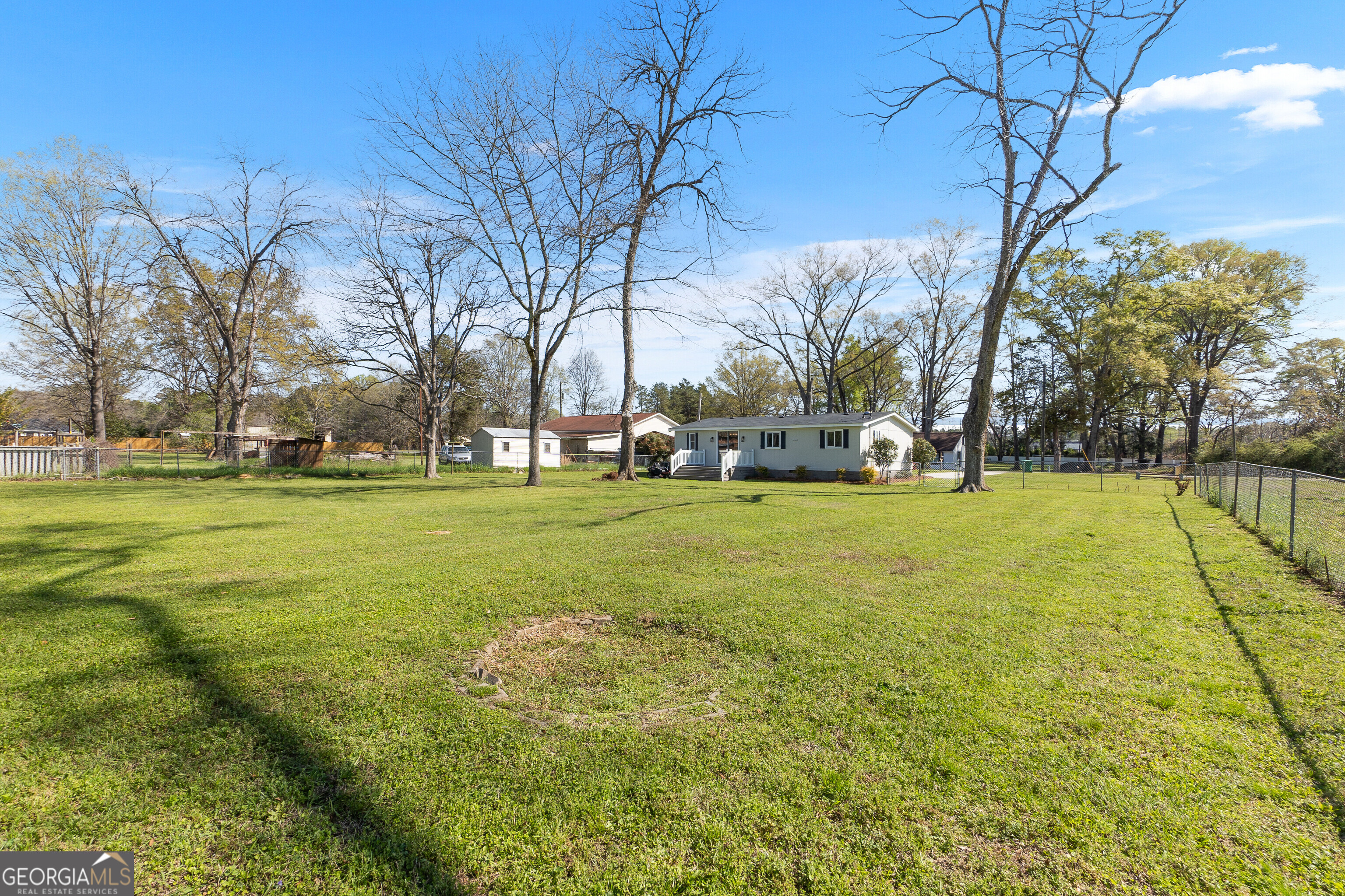 129 Walnut Street Bonaire, GA 31005 - Photo 29 of 31 a view of a volley ball court