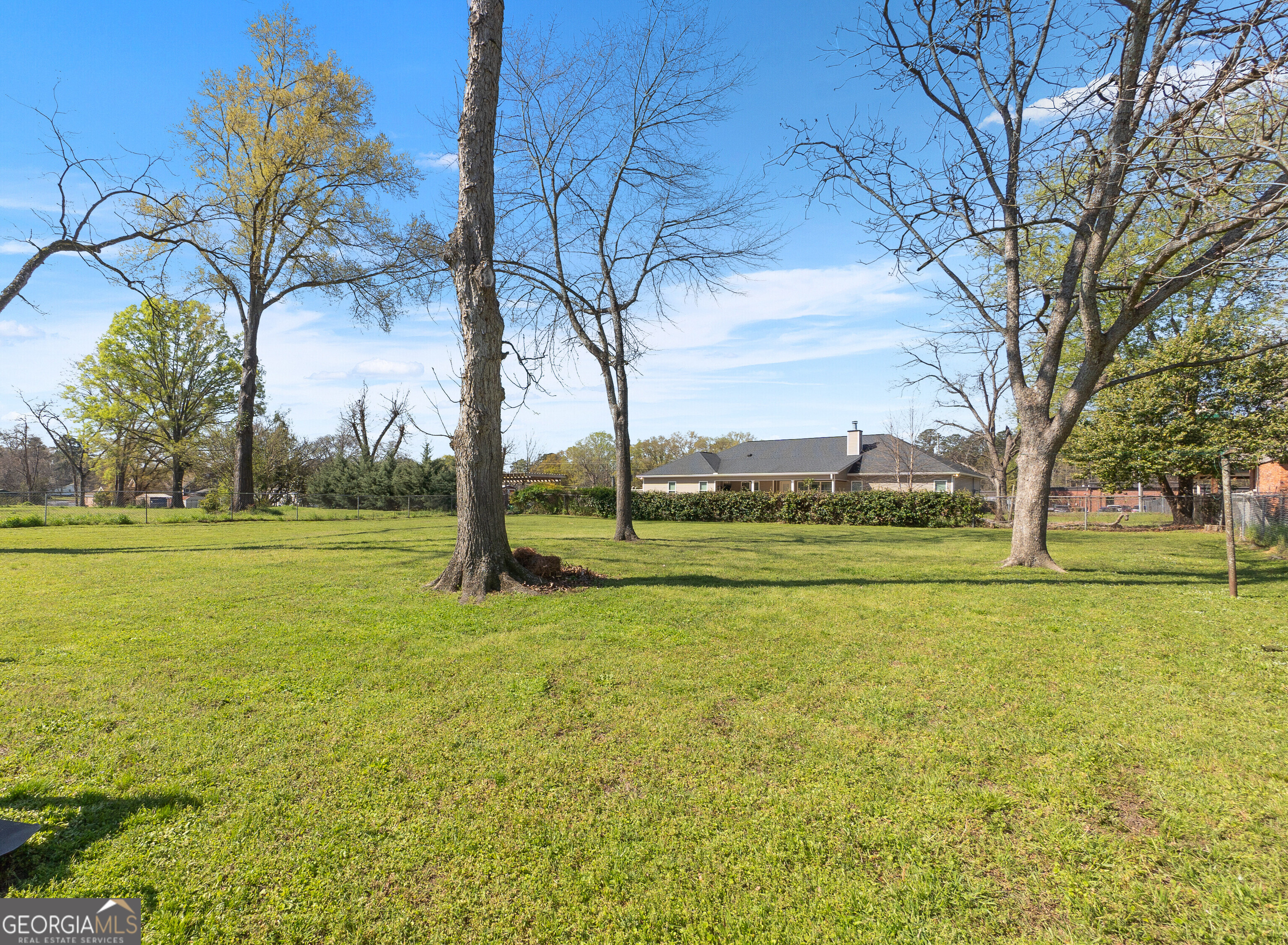 129 Walnut Street Bonaire, GA 31005 - Photo 31 of 31 a view of a large trees with a big yard