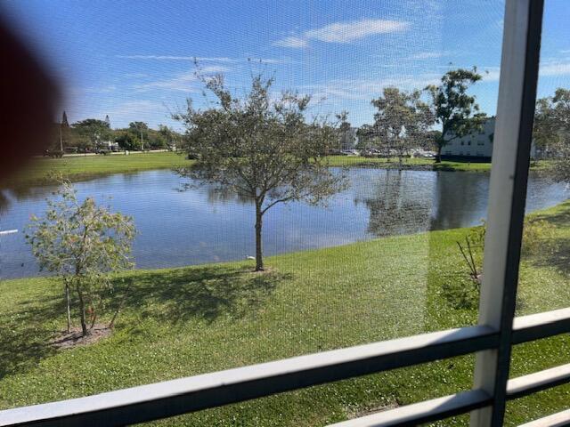 2048 Newcastle A, Unit 2048 Boca Raton, FL 33434 - Photo 16 of 18 PATIO WITH LARGE LAKE VIEW
