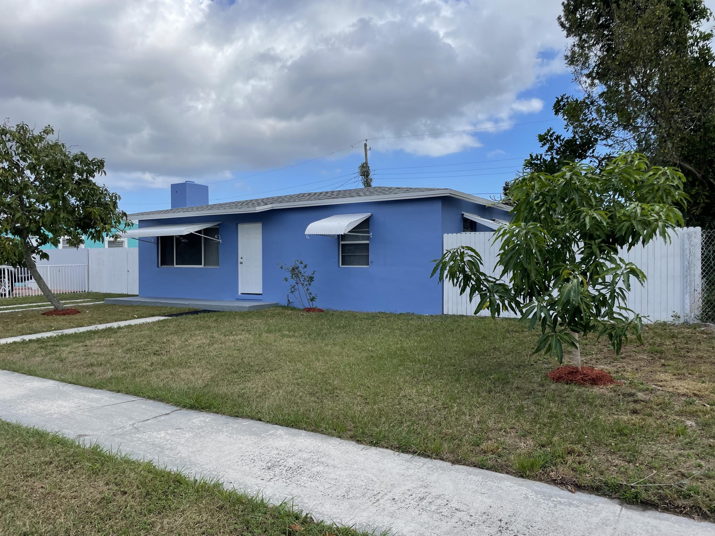 2336 Par Road West Palm Beach, FL 33409 - Photo 1 of 24 Front view