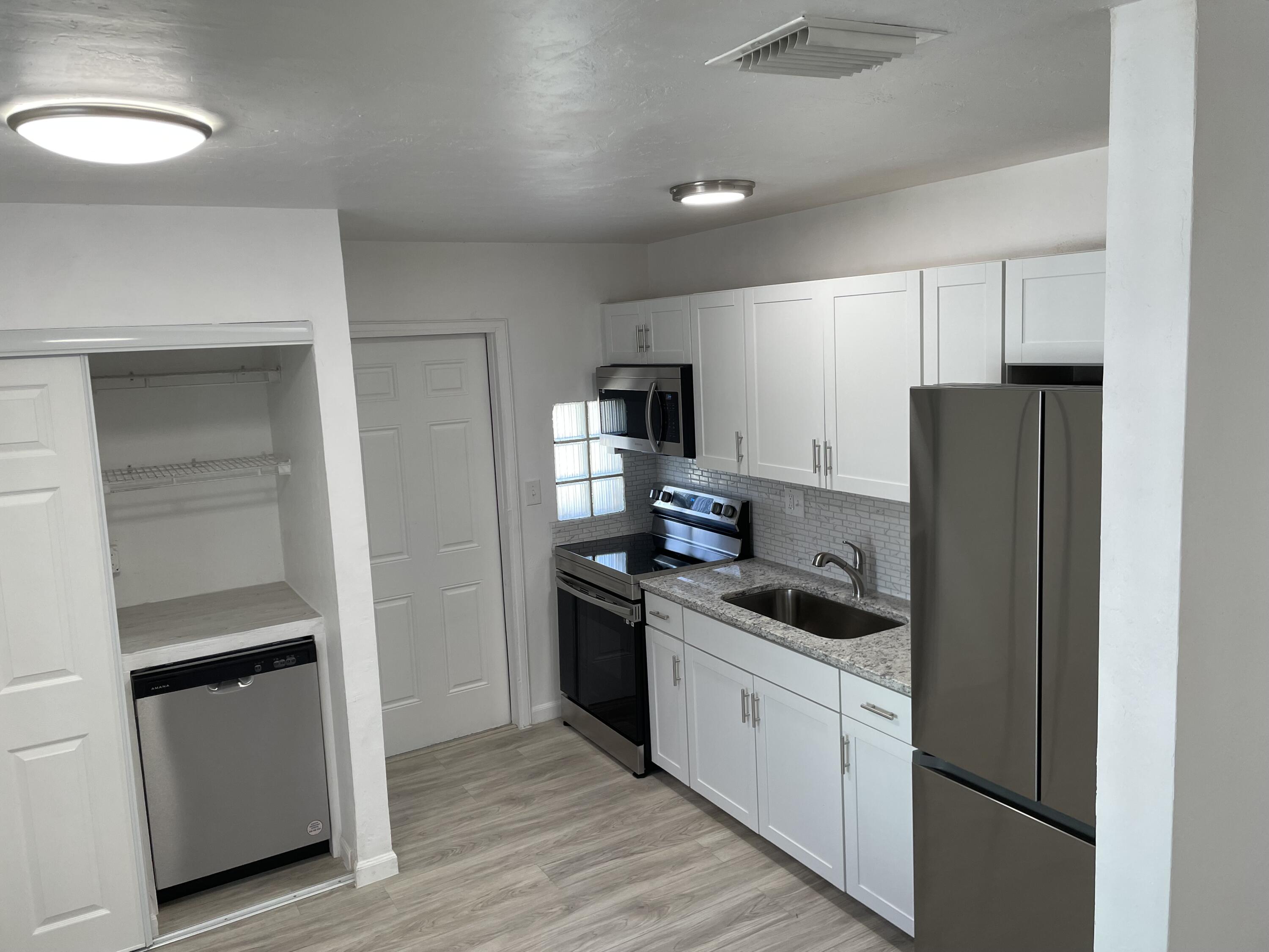2336 Par Road West Palm Beach, FL 33409 - Photo 11 of 24 Kitchen with Dishwasher
