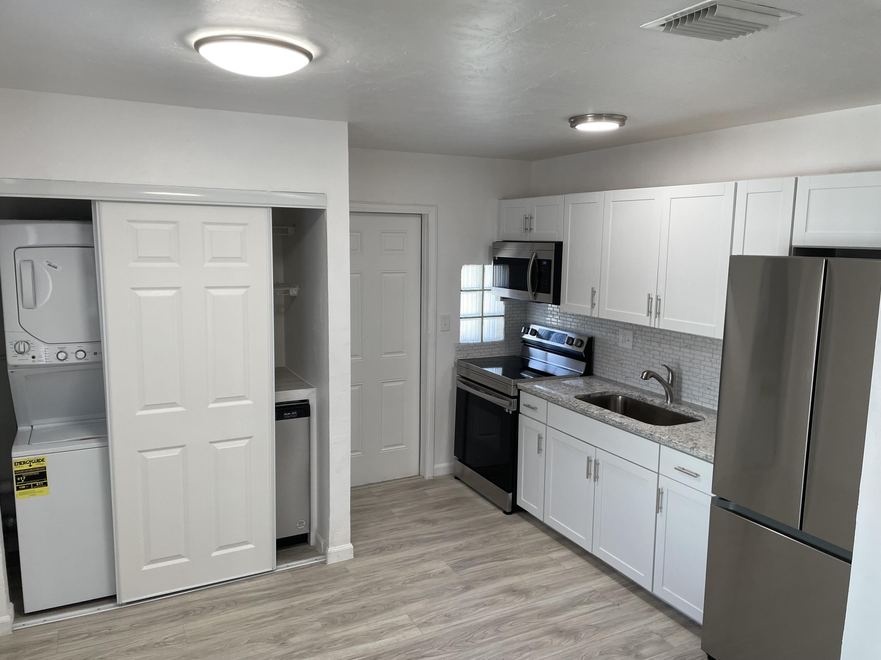 2336 Par Road West Palm Beach, FL 33409 - Photo 12 of 24 Kitchen with Dishwasher:Washer and dryer