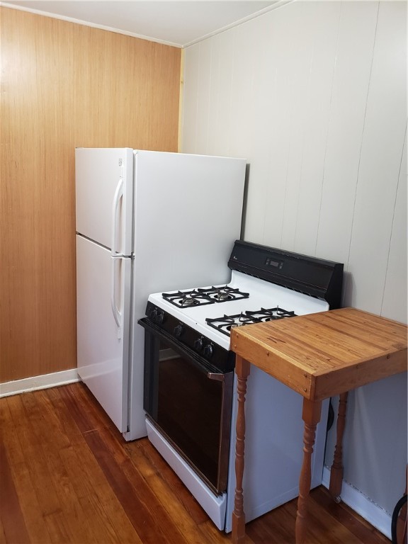 1806 2nd Street Corpus Christi, TX 78404 - Photo 3 of 7 a white refrigerator freezer sitting inside of a kitchen
