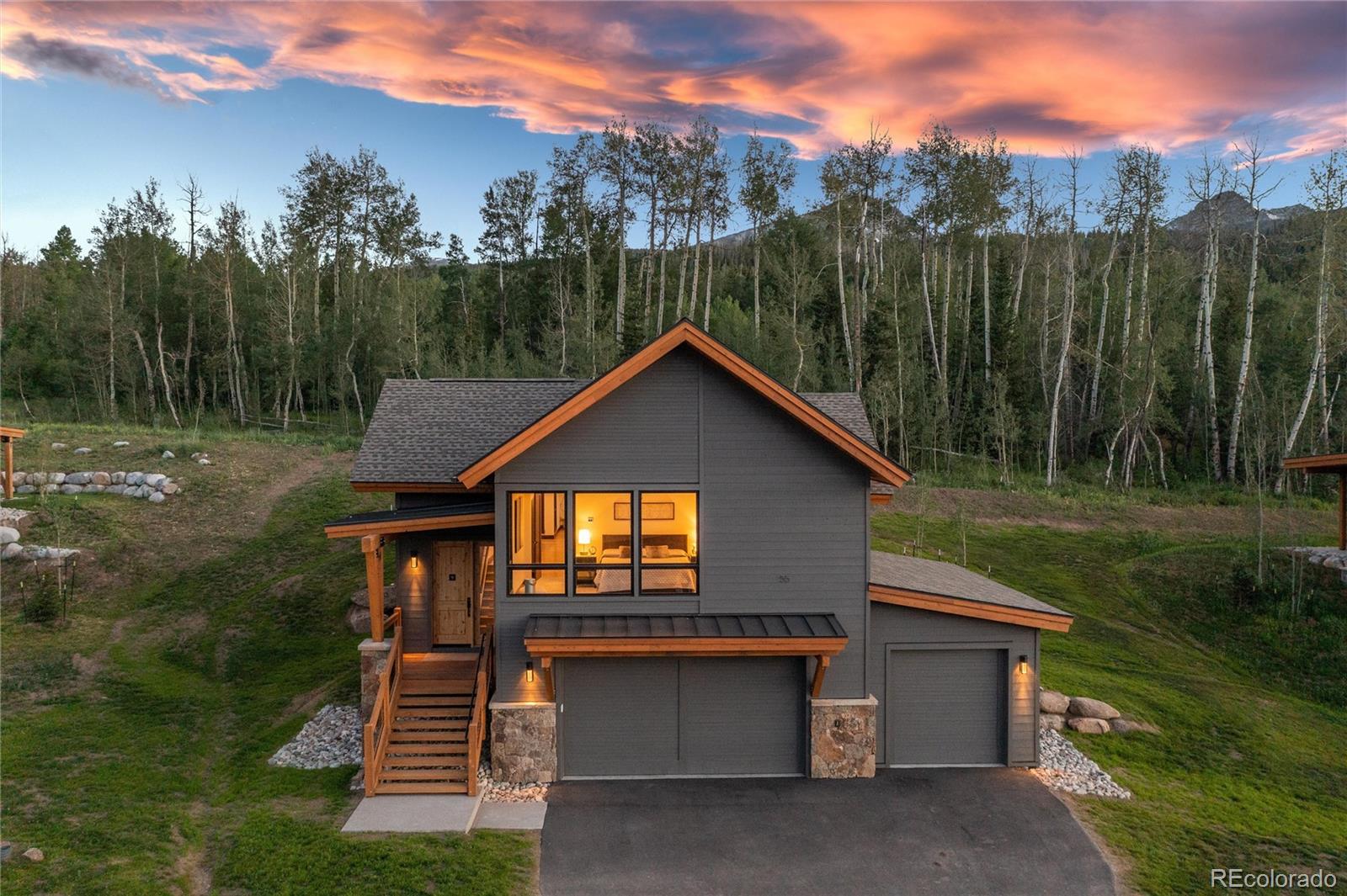 55 Glazer Trail Silverthorne, CO 80498 - Photo 1 of 40 a front view of a house with a yard